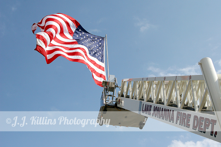 Shoreview MN flag at fire station by J.J. Killins